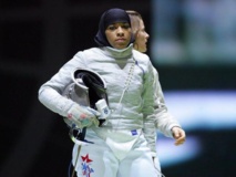La championne américaine d’escrime Ibtihaj Muhammad au lycée Kennedy, vendredi La championne américaine d’escrime Ibtihaj Muhammad au lycée Kennedy, vendredi