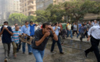 Au Caire, les forces de sécurité dispersent dans le sang les sit-in pro-Morsi