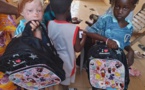 Journée de partage à Thies avec les jumelles albinos: Dons de crèmes solaires, vivres et inscriptions à l'école coranique. Merci à tous