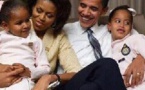 Souvenir : le couple Obama avec ses filles, à l'époque toutes petites...